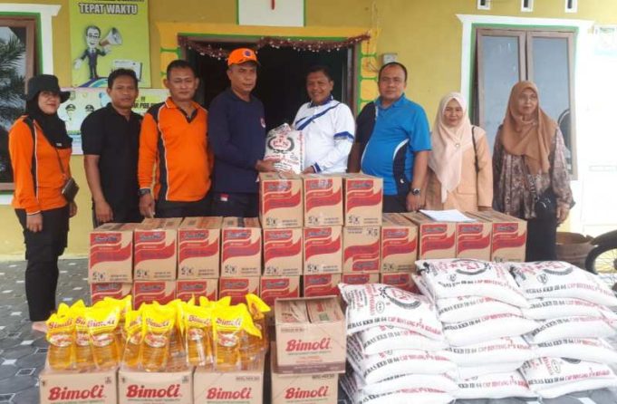 Penyaluran Bantuan Musibah Banjir Pada Masyarakat Desa Sei Dua Hulu