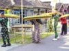 Cerita Kehangatan Satgas TMMD 129 Bojonegoro Bantu Olah Tembakau Petani Kesongo