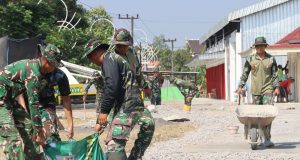 Satgas TMMD 129 Bojonegoro Bersih-Bersih Kawasan Rest Area Terpadu