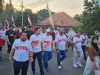 PTPN IV Regional VII Meriahkan HUT RI dengan Jalan Sehat dan Peduli UMKM