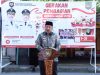 Bupati Asahan Pimpin Gerakan Pembagian Bendera Merah Putih
