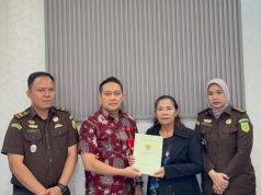 Kejari Asahan Kembalikan Sertifikat Tanah Kepada Herlina Hutauruk Berdasarkan Putusan MA